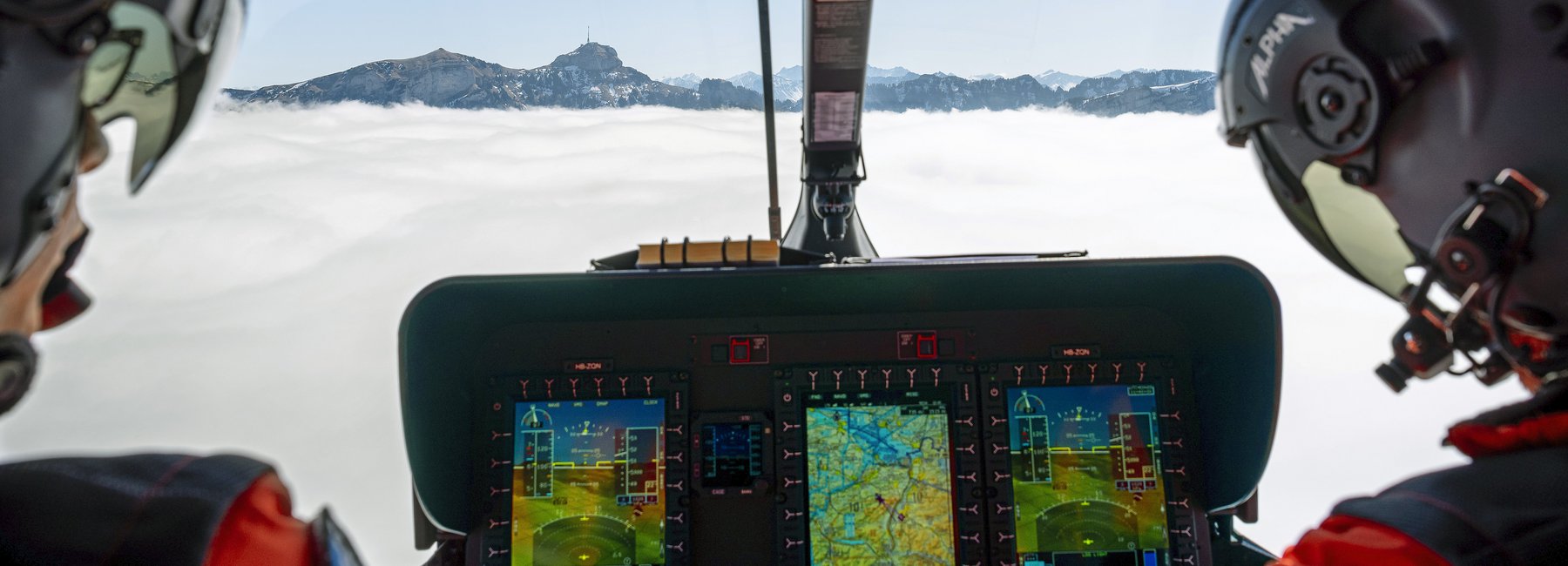 View from the cockpit above a cloud cover